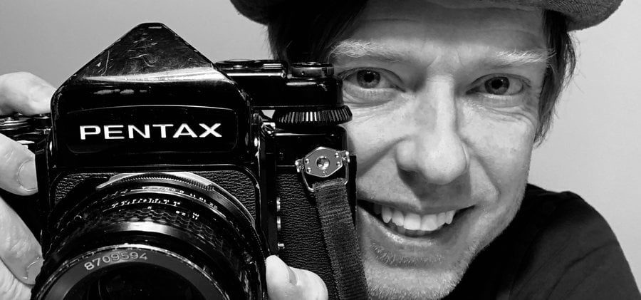 Porträtt med kamera