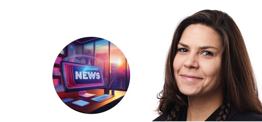 Porträtt av Maria Hedblom bredvid en datorskärm