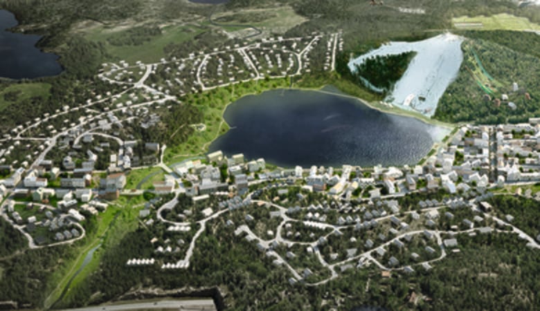 En arkitektskiss i form av en flygbild över Väsjön med all den planerade bebyggelsen.